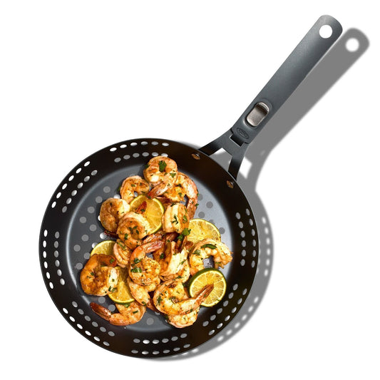 outdoor-10-perforated-carbon-steel-pan-g0 cc007441_10inpreseasonedbbqpan_pdp_01.jpg
